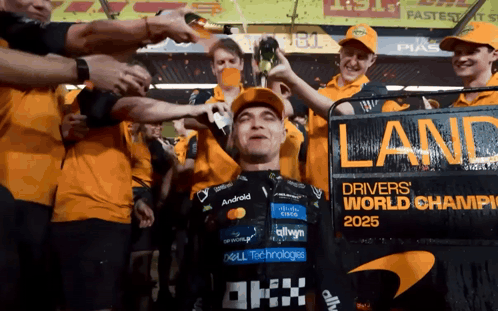 A Man Stands In Front Of A Sign That Says Land On It GIF