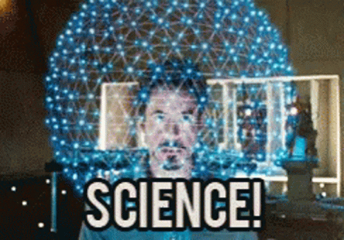 A Man Stands In Front Of A Sphere With The Words Science Written On It GIF