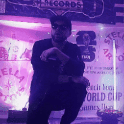 A Man Stands In Front Of A Stella Records Sign GIF