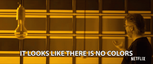 A Man Stands In Front Of A Wall With The Words It Looks Like There Is No Colors Netflix GIF