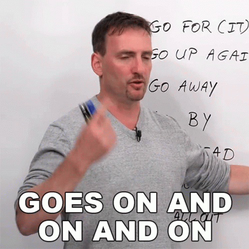 A Man Stands In Front Of A White Board And Says " Goes On And On " GIF