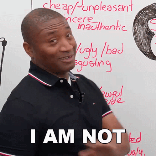 A Man Stands In Front Of A White Board That Says I Am Not On It GIF