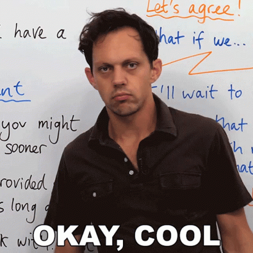 A Man Stands In Front Of A White Board That Says " Let 'S Agree " On It GIF