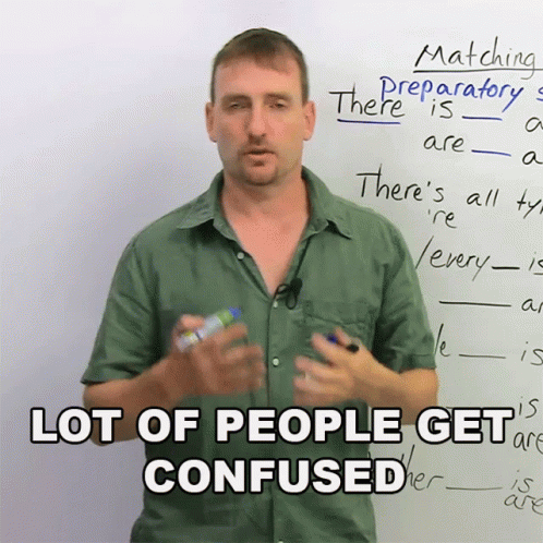 A Man Stands In Front Of A White Board With The Words " Lot Of People Get Confused " GIF