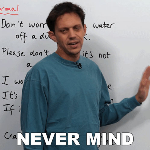 Man Standing In Front Of White Board With Never Mind GIF