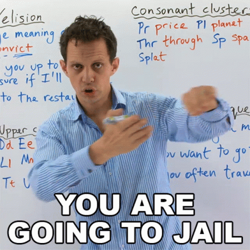 A Man Stands In Front Of A White Board With The Words You Are Going To Jail On It GIF