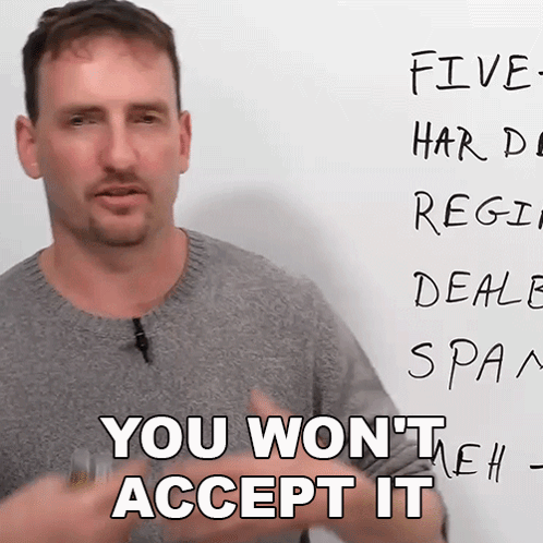 A Man Stands In Front Of A White Board With The Words You Won 'T Accept It Written On It GIF