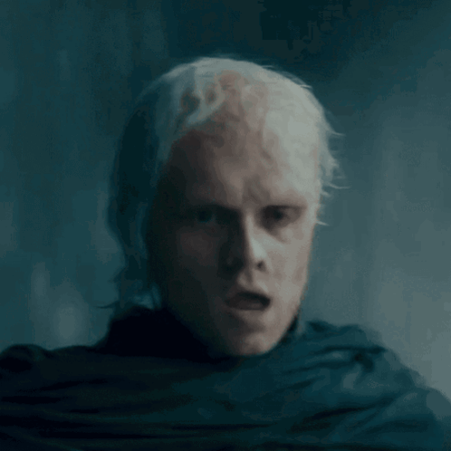 A Man Stands In The Middle Of A Ruined Building In The Fog GIF