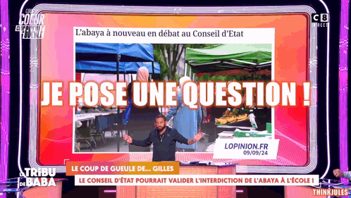 A Man Stands On A Stage In Front Of A Sign That Says Je Pose Une Question GIF