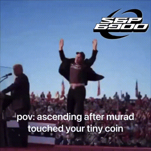 A Man Stands On A Stage With His Arms In The Air And The Words " Ascending After Murad Touched Your Tiny Coin " GIF