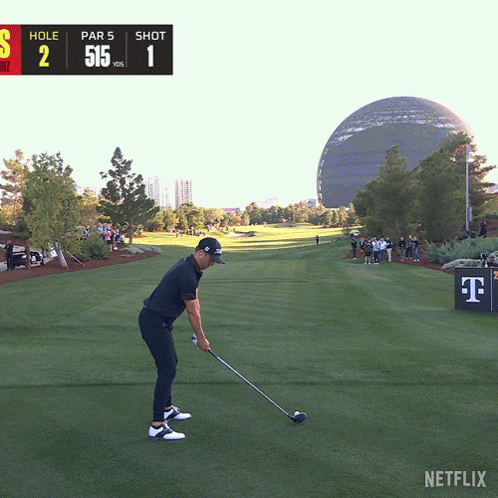 A Man Swings A Golf Club On A Golf Course With A Netflix Logo In The Corner GIF