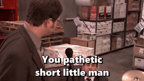 A Man Talking Into A Microphone With The Words You Pathetic Short Little Man GIF