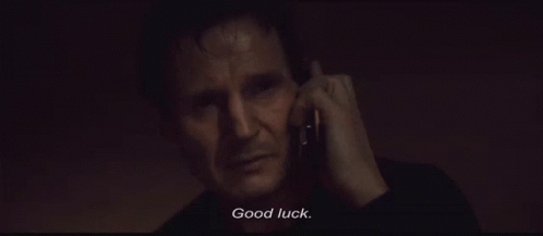 A Man Talking On A Cell Phone With The Words " Good Luck " On The Bottom GIF