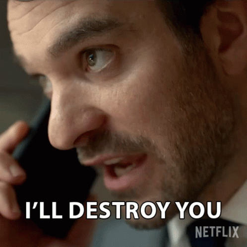 A Man Talking On A Cell Phone With The Words I 'Ll Destroy You On The Bottom GIF