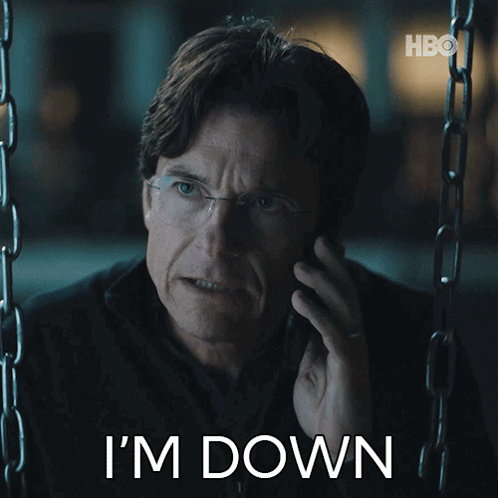 A Man Talking On A Cell Phone With The Words " I 'M Down " Next To Him GIF