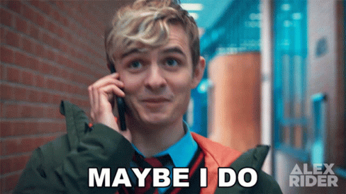 A Man Talking On A Cell Phone With The Words " Maybe I Do " Above Him GIF