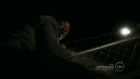 A Man Talking On A Cell Phone With The Words " What I 'M Busy " Above Him GIF
