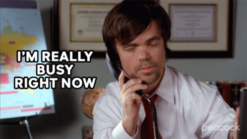A Man Talking On A Phone With The Words I 'M Really Busy Right Now GIF