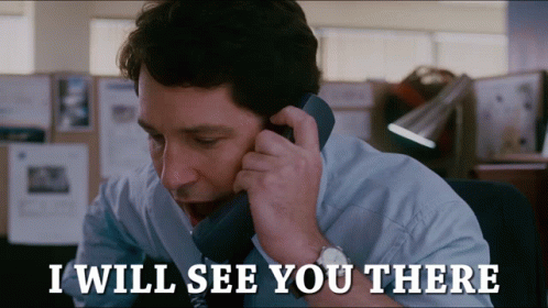 A Man Talking On A Phone With The Words " I Will See You There " Above Him GIF