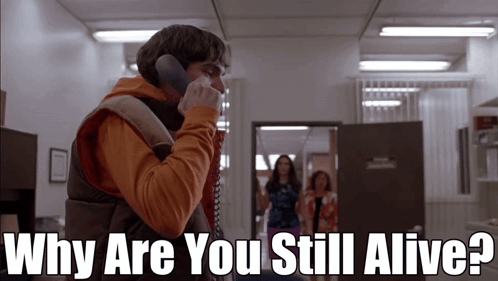 A Man Talking On A Phone With The Words Why Are You Still Alive GIF