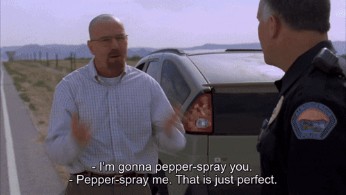 A Man Talking To A Police Officer Who Says I 'M Gonna Pepper Spray You GIF