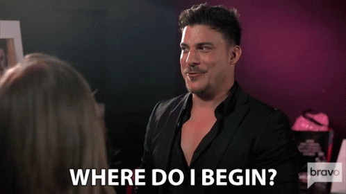 A Man Talking To A Woman With The Words Where Do I Begin GIF