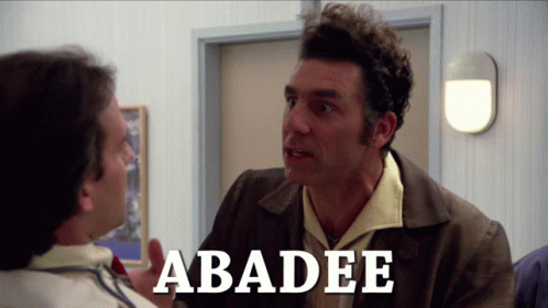 A Man Talking To Another Man With The Word Abadie Written On The Screen GIF