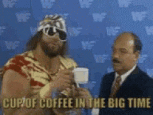 A Man Talking To Another Man With The Words Cup Of Coffee In The Big Time Written On The Bottom GIF
