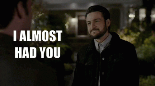 A Man Talking To Another Man With The Words I Almost Had You GIF