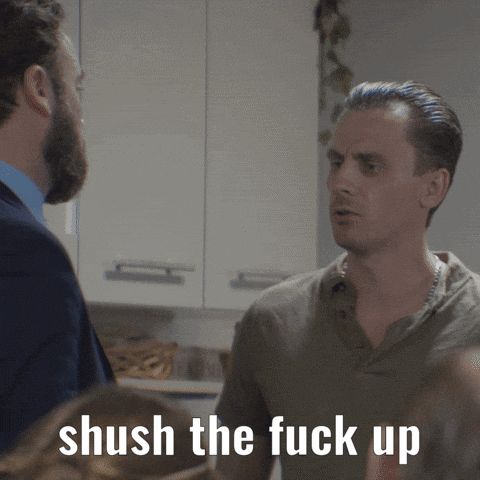 A Man Talking To Another Man With The Words " Shush The Fuck Up " Above Him GIF