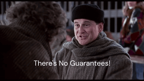 A Man Talking To Another Man With The Words " There 'S No Guarantees " On The Bottom GIF