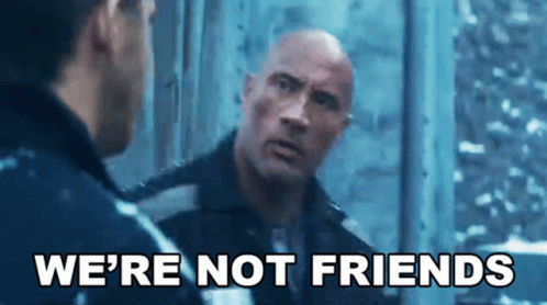 A Man Talking To Another Man With The Words " We 'Re Not Friends " Written Above Him GIF
