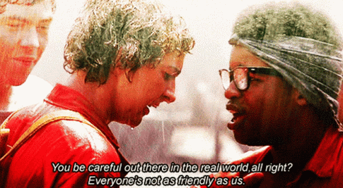 A Man Talking To Another Man With The Words " You Be Careful Out There In The Real World All Right " Written Below Him GIF