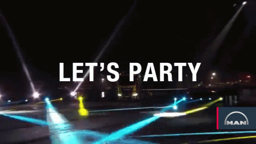 A Man Truck Is Driving Down The Road At Night GIF