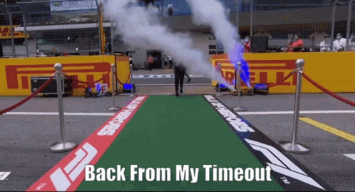 A Man Walking Down A Green Carpet With The Words Back From My Timeout On It GIF