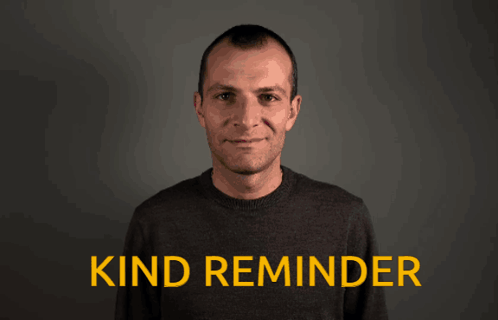 a man waves his hand in front of the words kind reminder