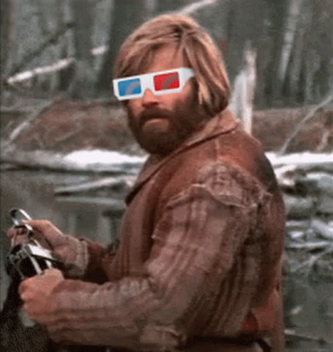 A Man Wearing 3D Glasses Is Holding A Camera GIF
