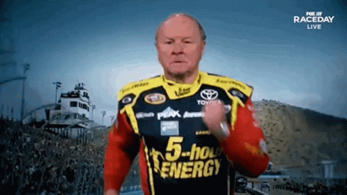 A Man Wearing A 5 Hour Energy Shirt Is Running GIF