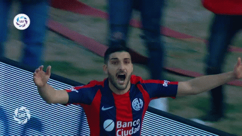 A Man Wearing A Banco Ciudad Jersey Celebrates A Goal GIF