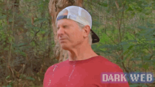 a man wearing a baseball cap is screaming with the words awww yuck dark web written behind him