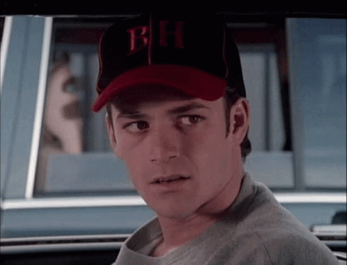 A Man Wearing A Baseball Cap That Says Bh GIF