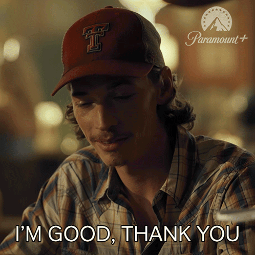 A Man Wearing A Baseball Cap With The Letter T On It Says I 'M Good Thank You GIF