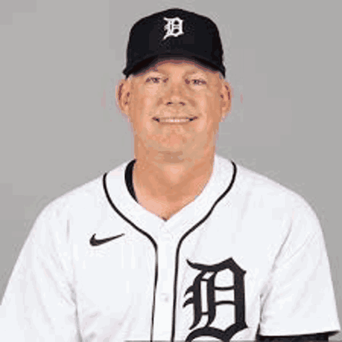 A Man Wearing A Baseball Uniform With The Letter D On The Front GIF