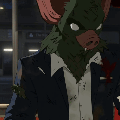 A Man Wearing A Bat Mask Is Eating A Sandwich GIF