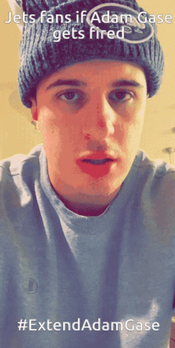 A Man Wearing A Beanie And A Gray Shirt With The Caption Extend Adam Case GIF