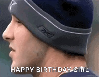 A Man Wearing A Beanie Is Saying " Happy Birthday Girl " GIF