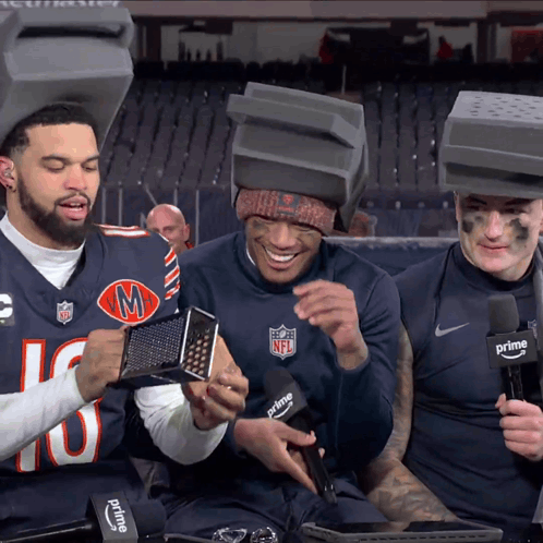 A Man Wearing A Bears Jersey Holds A Grater GIF