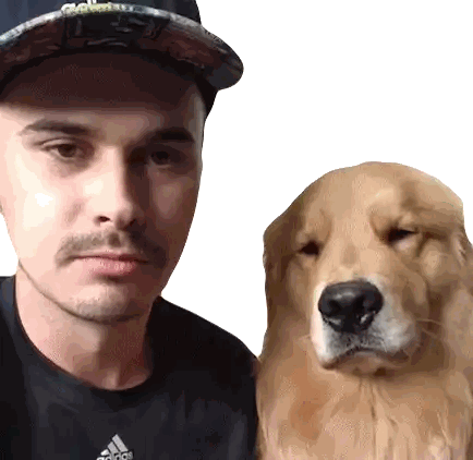 a man wearing a black adidas shirt is standing next to a dog