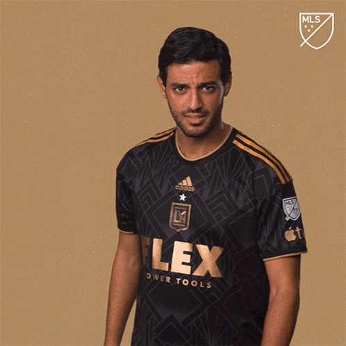 A Man Wearing A Black And Gold Jersey That Says Lex Power Tools GIF