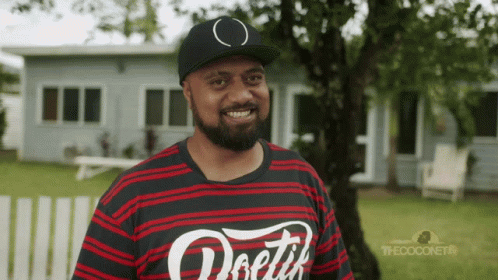 A Man Wearing A Black And Red Striped Shirt That Says ' Doetik ' On It GIF